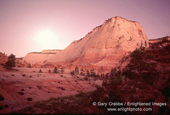 Evening moonrise over Checkerboard Mesa, Zion National Park, Utah