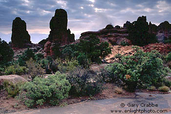 Morning rain storm clearing over red rocks of Arches National Park, Utah