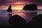 Sunset through storm clouds over sea stacks, Ruby Beach, Olympic National Park, Washington