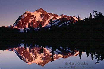 Mount Shuksan reflected in alpine lake, Mount Baker National Recreation Area, Cascade Mountain Range, Washington