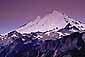 Pre-dawn light over snow covered glacier of Mount Baker volcano, Cascade Mountain Range, Washington