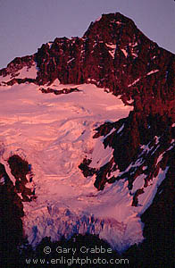 Alpenglow at sunset on hanging glacier on Mount Shuksan, Mount Baker National Recreation Area, Cascade Mountain Range, Washington