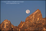 Picture og Full moon setting over the summit of the Grand Teton mountain at sunrise, Grand Teton National Park, Wyoming