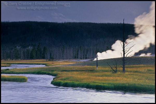 Photo: Steam from hot spring at edge of the Firehole River at sunset, Biscuit Basin, Yellowstone National Park, Wyoming