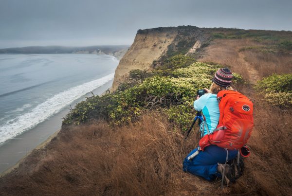 Photo: Photographer shooting the cliffs of Drakes Bay during a photo workshop at Point Reyes National Seashore, Marin County, California