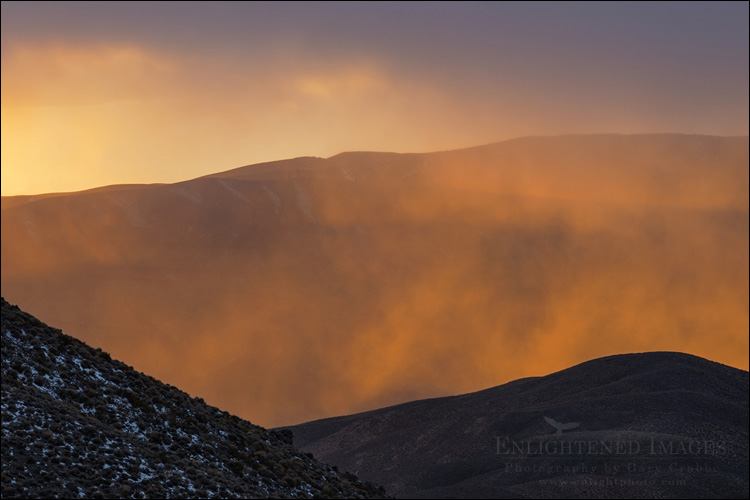Image: Sunset light on misty clouds at Aguereberry Point, Death Valley National Park, California