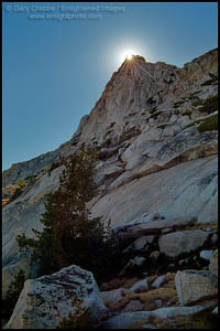Photo: Sunbrust through rocks on the crest of Vogelsang Peak, Yosemite National Park, California