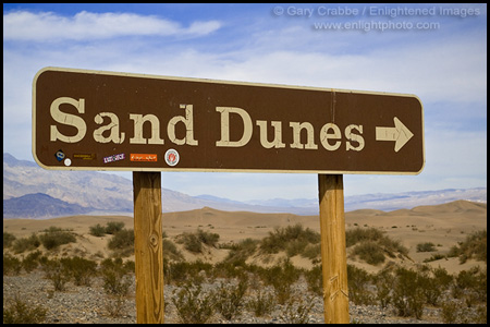 Road sign pointing to Sand Dunes at Mesquite Flat, Death Valley National Park, California