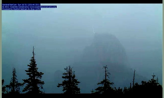 Image: Lightning strikes the summit of Half Dome as seen from one of the Yosemite Web Cams, Yosemite National Park, California
