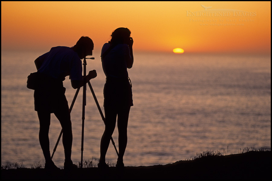 Image: Photographer couple shooting the sunset together from the Marin Headlands, California
