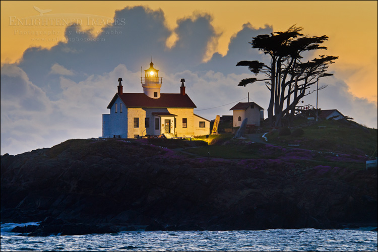 Image: Storm clouds at sunset passing behind Battery Point Lighthouse, Crescent City, California