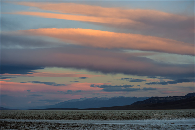 Image: Morning light on clouds over the Badwater Basin, Death Valley National Park, California