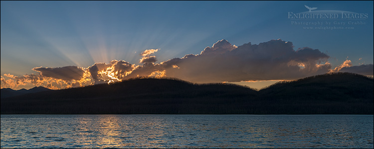 Image: Sunset light through clouds and campfire smoke over Lake MacDonald, Glacier National Park, Montana
