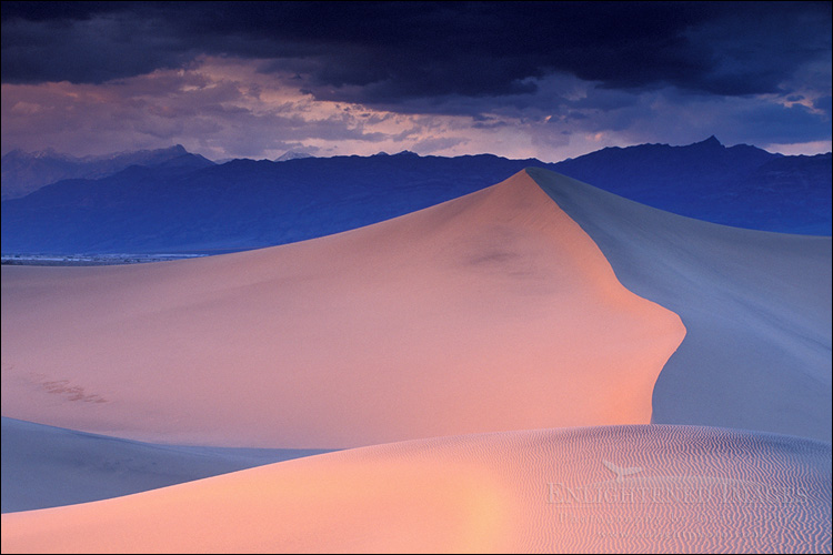 Image: Storm clouds in evening over sand dunes and mountains, Stovepipe Wells, Death Valley National Park, California