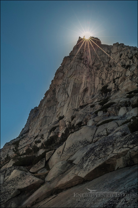 Image: Sunburst behind rocky spire near Vogelsang Pass, Cathedral Range, Yosemite National Park, California