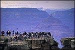 Picture: Tourists crowd onto overlook at Mather Point, South Rim, Grand Canyon National Park, Arizona