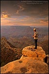 Picture: Tourist on the edge of the canyon rim at sunset, Grandview Point, Grand Canyon National Park, Arizona