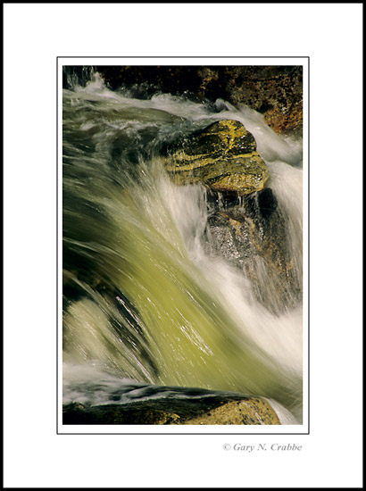 Photo: Water in the Merced River flowing over rocks, Yosemite National Park, California