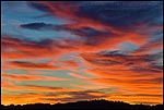 Photo: Red and orange clouds at sunset over the East Bay Hills, near Orinda, California