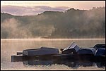 Picture: Row boats turned upside down on dock on a misty morning, Lafayette Reservoir, Lafayette, California