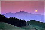 Picture: Full moon rising in evening over Mount Diablo, from the East Bay Hills near Orinda, California