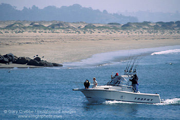 Sport fishing boat returning to harbor at Morro Bay, Central Coast, California; Stock Photo photography picture image photograph fine art decor print wall mural gallery