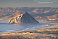 Looking out over beach towards Morro Rock at sunset, Central Coast, California