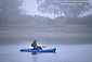 Kayaking in the calm waters and fog at Morro Bay, Central Coast, California