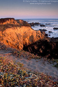 Sunset light on coastal cliff at Piedras Blancas, near San Simeon, Central Coast, California; Stock Photo photography picture image photograph fine art decor print wall mural gallery