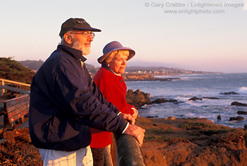 Tourist couple watching the sunset from Leffingwell Landing, Cambria, Central Coast, California; Stock Photo photography picture image photograph fine art decor print wall mural gallery