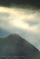 Sunrise light on coastal fog over hillside near Cambria, Central Coast, California