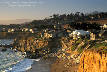 Coastal homes and cliffs at sunset on coastal shoreline at Cambria, Central Coast, California; Stock Photo photography picture image photograph fine art decor print wall mural gallery