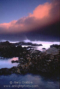 Waves crashing on rocks in the Pacific Ocean at sunrise, Asilomar, Carmel coast, Monterey Peninsula, California