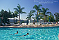 Couple swimming in pool at Four Season's Aviara Hotel and Resort, Carlsbad, San Diego County, California