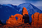 Stormy sunset light on Turret Arch below the LaSal Mountains, Arches National Park, Utah