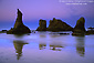 Pre-dawn light over coastal sea stacks at Bandon State Beach, Bandon, Oregon