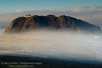 Coastal fog and mist in morning at the Point Sur Lighthouse, Big Sur Coast, California