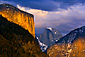 Storm clouds at sunset over El Capitan and Half Dome, Yosemite Valley, California