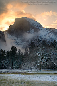 Half Dome during a clearing spring snowstorm at sunrise, Yosemite Valley, California