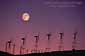 Full moon over windmills at Altamont Pass, California