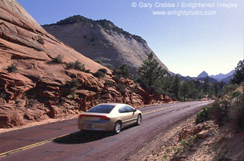Car on the Zion - Mount Carmel Highway near Checkerboard Mesa, Zion National Park, Utah