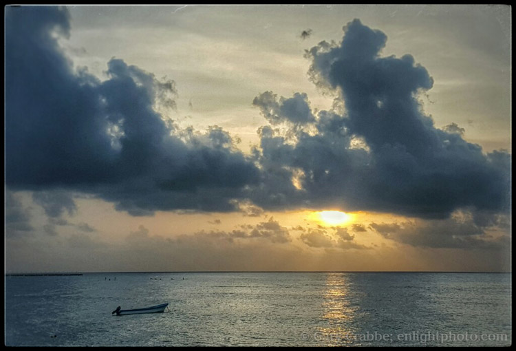 Image: Sunrise over boat at Playa Del Carmen, Yucatan Peninsula, Mexico