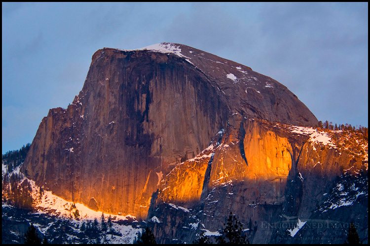 Photo: Narrow band of sunset light through spring storm clouds on the face of Half Dome, Yosemite National Park, California - ID# VLY2-2488