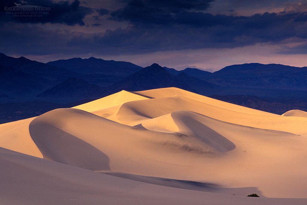 Photo: Storm clouds over star sand dunes and mountains at sunset, Stovepipe Wells, Death Valley National Park, California