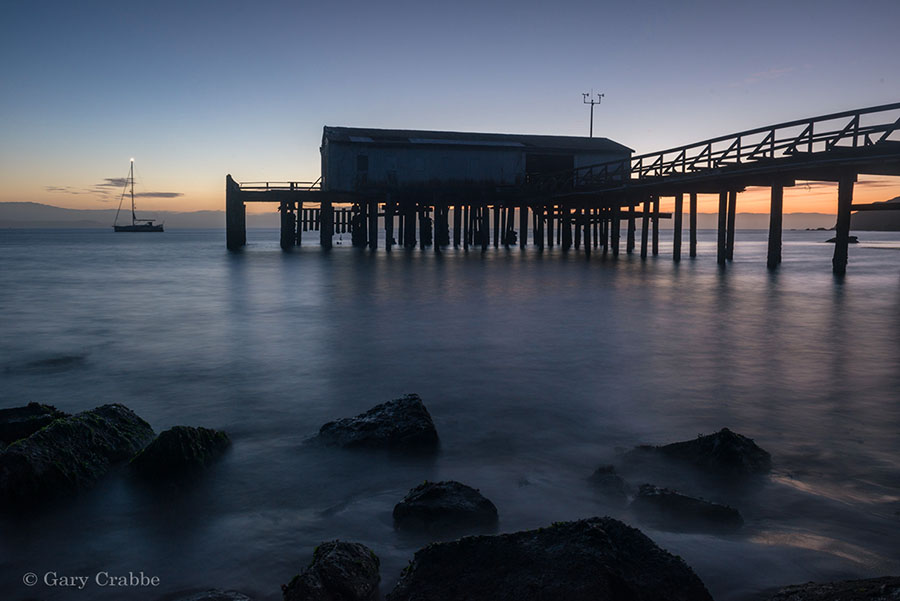 Photo: Dawn light over the old fish station dock on Drakes Bay, Point Reyes National Seashore, Marin County, California
