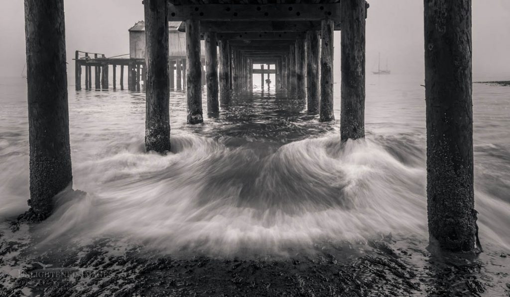 Photo: Wave breaking beneath dock in Point Reyes National Seashore, Marin County, California