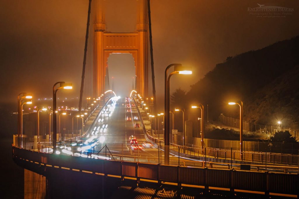 Photo picture of San Francisco Traffic on the Golden Gate Bridge at night in fog, from Vista Point, Marin County, California