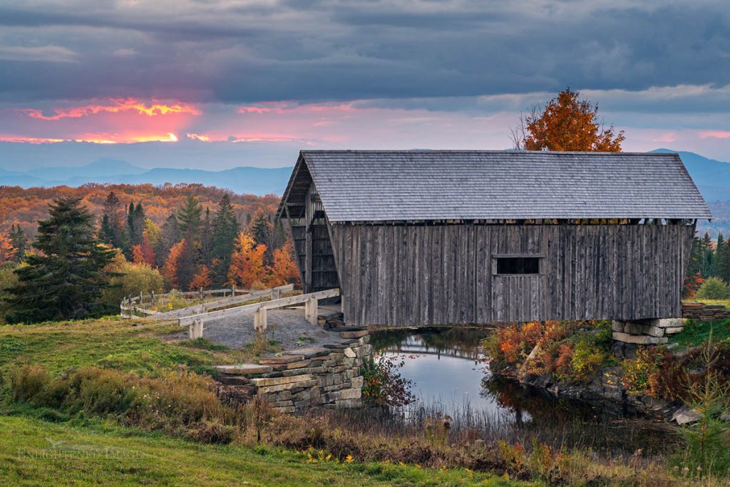 Photo picture of Stormy fall sunset over covered bridge in northern Vermont