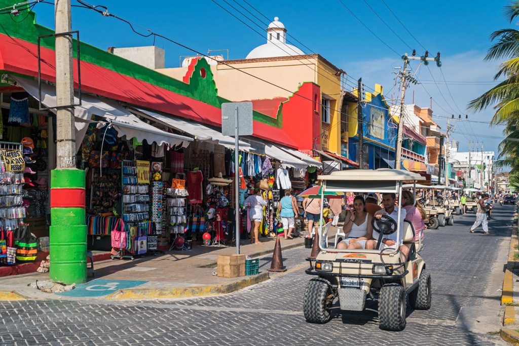Photo: Tourists using rental golf carts for transportation, near Playa Centro, Isla Mujeres, Yucatan Peninsula, Quintana Roo, Mexico