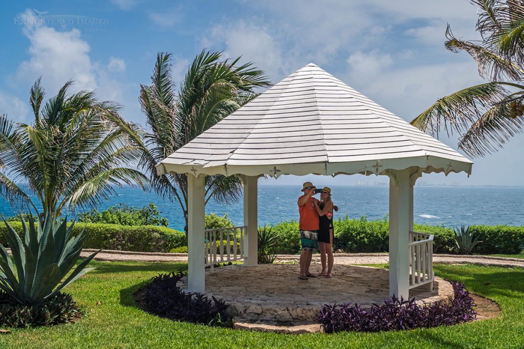 Photo: Couple taking a romantic vacation selfie under a gazebo at Punta Sur, Isla Mujeres, Yucatan Peninsula, Quintana Roo, Mexico
